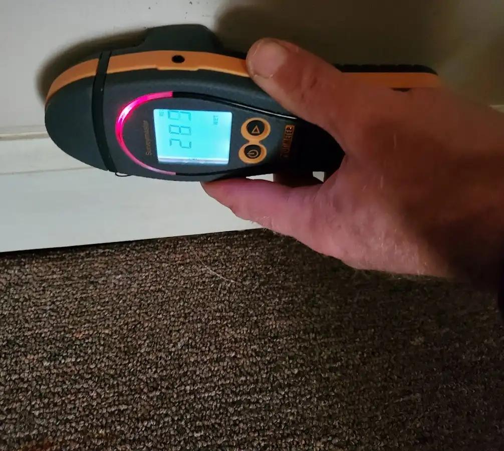 Moisture detection at baseboard during Storm Damage Restoration in Kings Mountain
